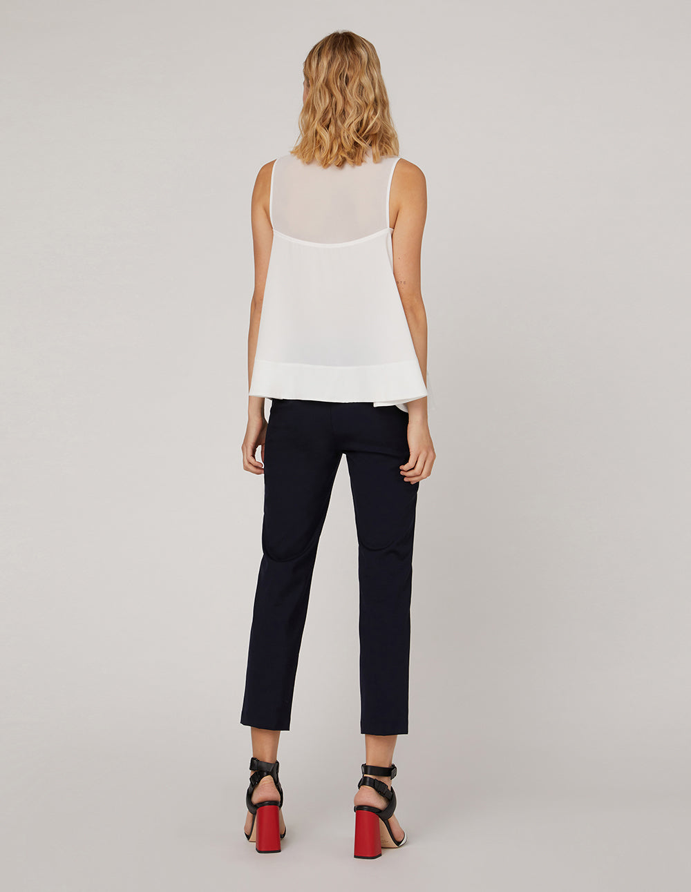 MARYLING White neckline sleeveless loose A-shaped hem top